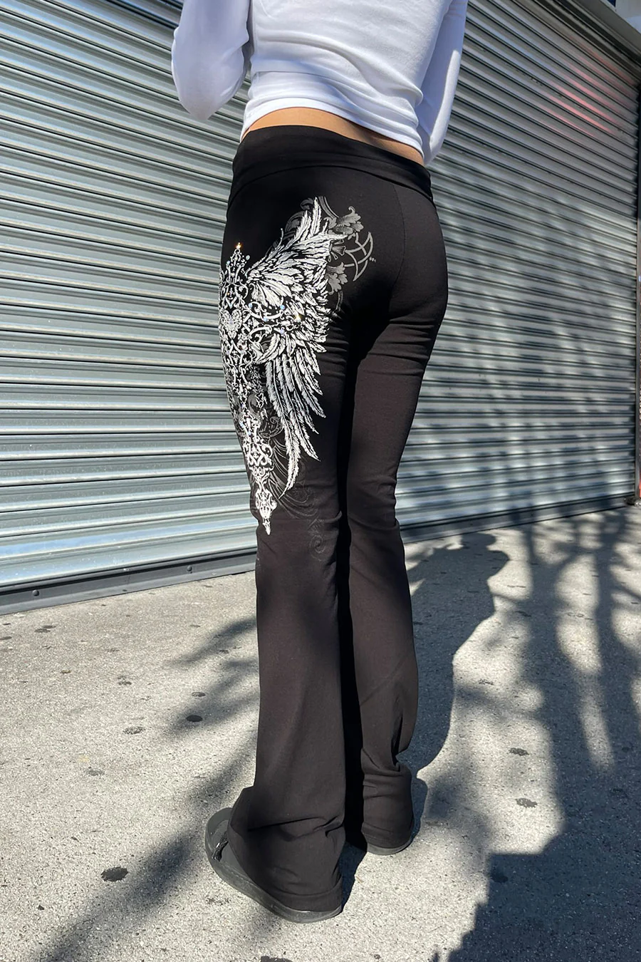Y2K McBling Pierce Heart Cross & Wing Graphic Rhinestone Print Fold-Over Flare Pants - Image 3