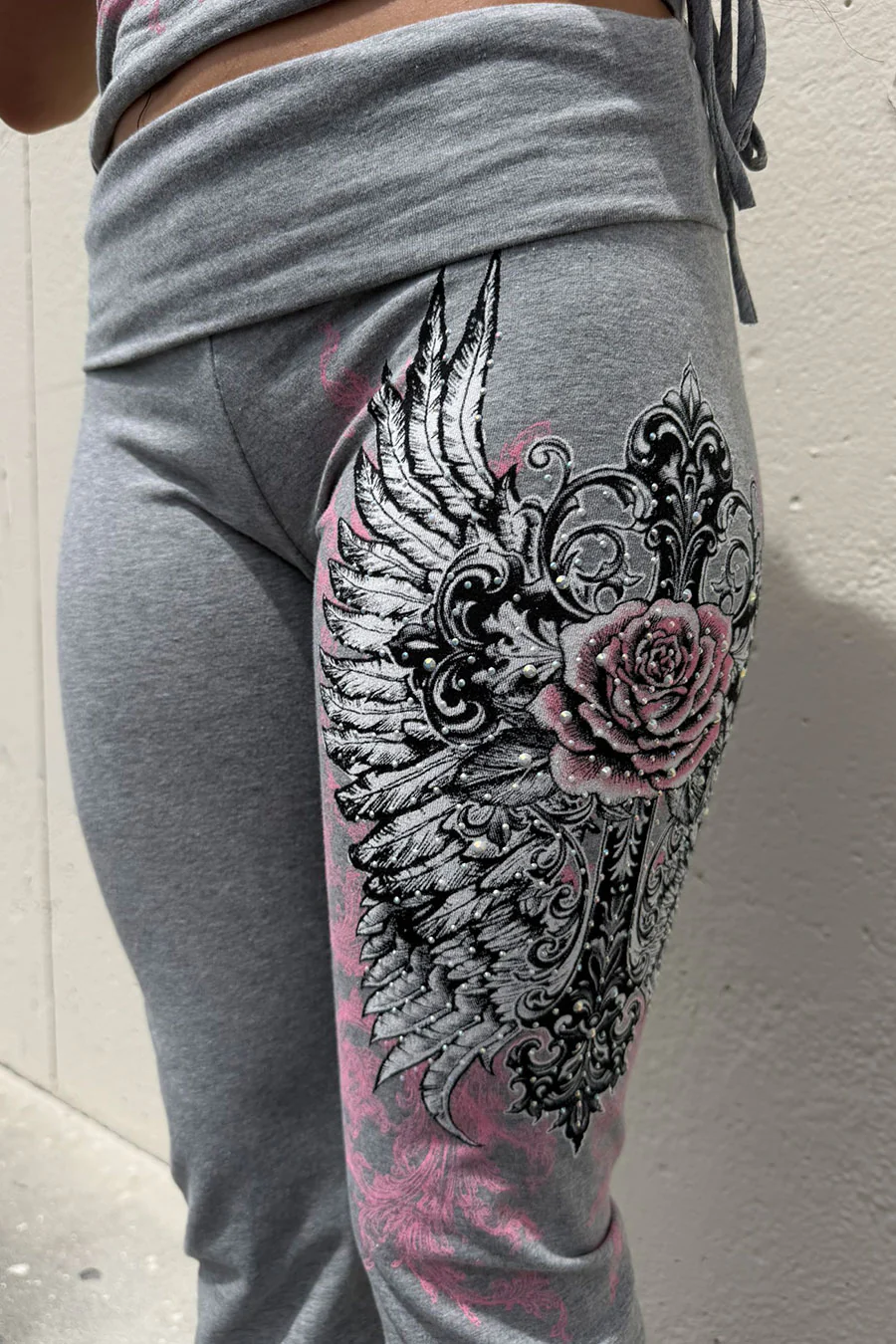 Y2K McBling Soft Pink Rose & Wing Graphic Rhinestone Print Fold-Over Flare Pants - Image 7